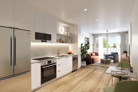 Modern open-concept kitchen and living area with sleek finishes, clean lines, and abundant natural light.  (The Code - 202)