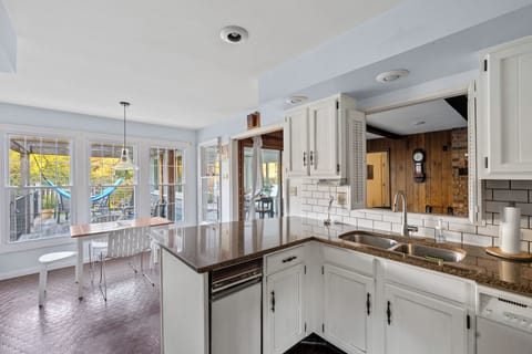 Kitchen and dining nook with easy access to the sitting area for casual meals and gatherings.
