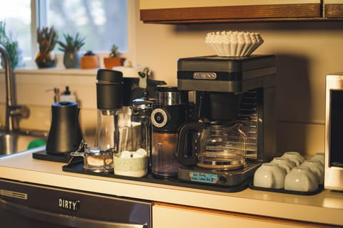 Full coffee bar with drip, pour over, and French press options.