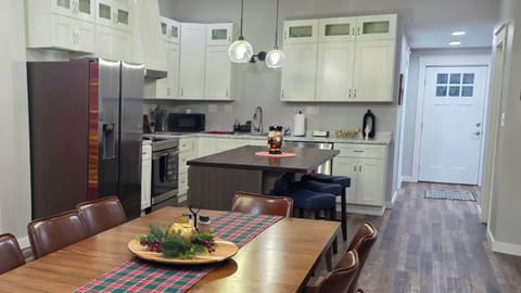 Full kitchen with all amenities (fridge, stove, oven, microwave, pantry, sink)