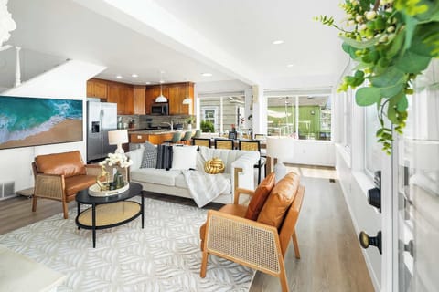 Bright and cozy living space with modern touches, perfect for relaxing after a day at the beach.