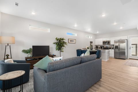 Living room, dining, and kitchen. Stream your favorite entertainment. Sofa pulls out to a sleeper