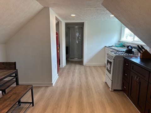 At the end of the kitchen, your bathroom in the eaves!