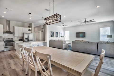 Open design that blends dining, cooking, and relaxing into one harmonious space.