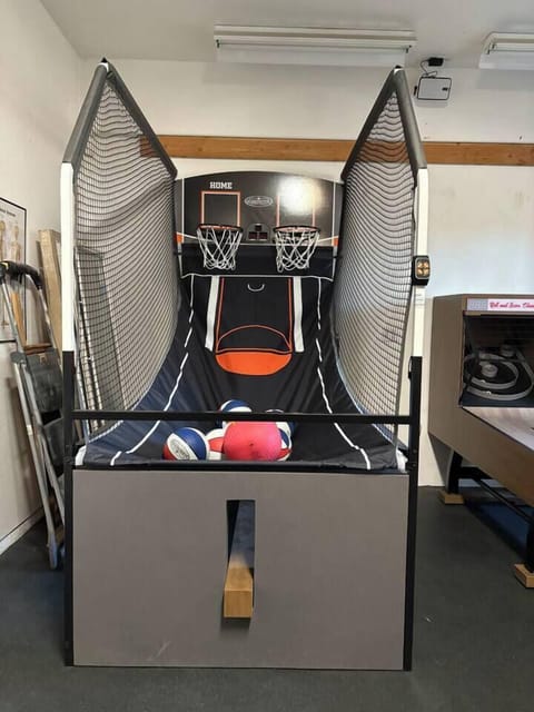 Challenge your friends to a game on the arcade basketball machine!
