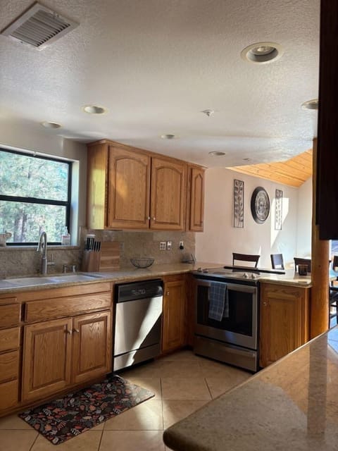 Warm wood kitchen with modern touches.