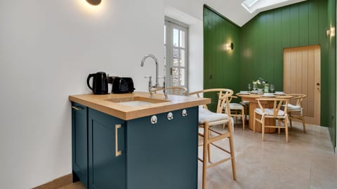 Whether you just have a quick breakfast at the bar or a more formal sit down meal together this is a light and bright room.