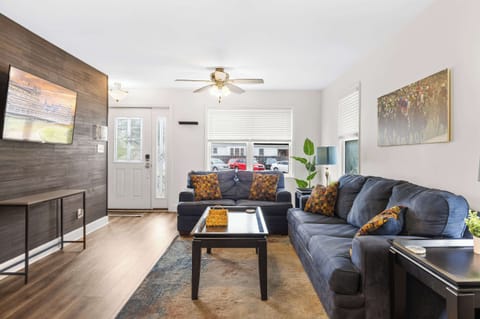 Living Room: Modern Comfort, Timeless Warmth – Thoughtfully designed with plush seating, natural light, and calming tones, this space is the heart of your stay.