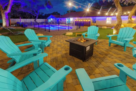 Backyard oasis with pool, hot tub, playscape