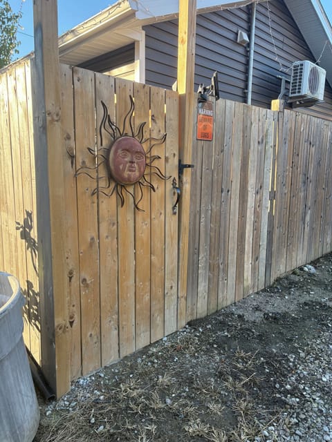 Parking along side this fence.  This is the entrance door.