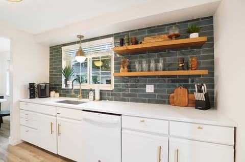 Keurig coffee maker and starter amount of regular coffee pods.