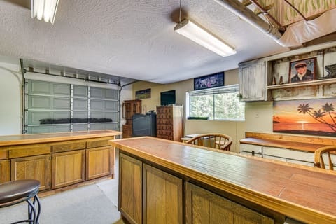 Game room with bar seating | Casual hangout space for family fun