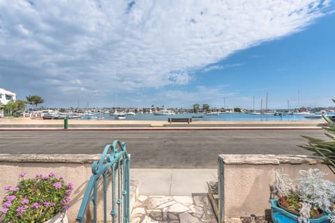 This bayfront home offers the ideal layout for families of all ages to enjoy endless beach and bay activities just steps away