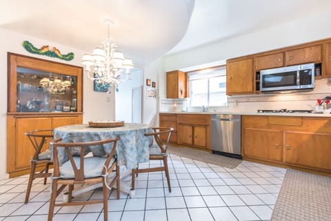 Located on the first floor, the kitchen includes a cozy breakfast table with seating for four