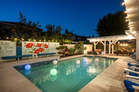 Welcome to Storybook Sunshine, our newest Stay Hello Sunshine escape, where magic meets relaxation. Gather by the fire pit, dine under the chandelier, take a dip in the pool, and Be Part of Our Story.