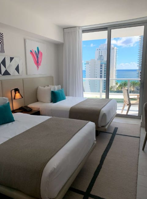 2 Bedroom Oceanview Poolview Suite Guest Bedroom 2 Double Beds
