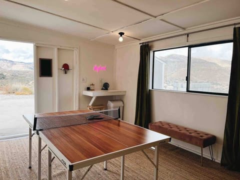 The game room is detached for late-night fun without sound traveling to the bedrooms