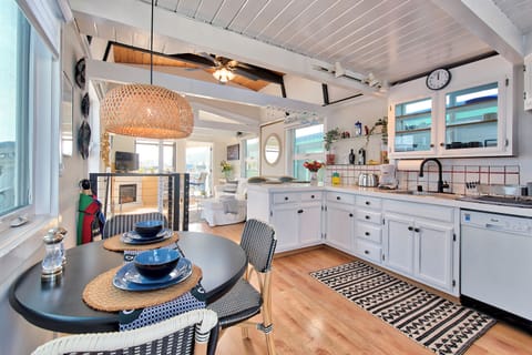 Kitchen, dining, breakfast bar and French Door to the back Deck.

