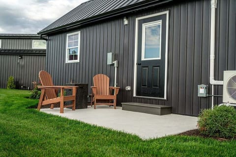 Back patio with two chairs