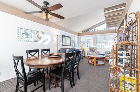 Enjoy meals together in the dining area, which comfortably seats six