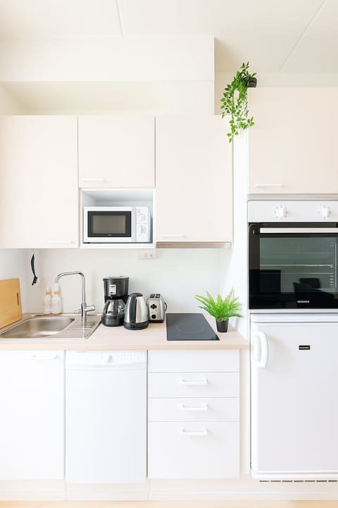 Cook, dine, and savor your coffee in this bright, guest-ready kitchen.