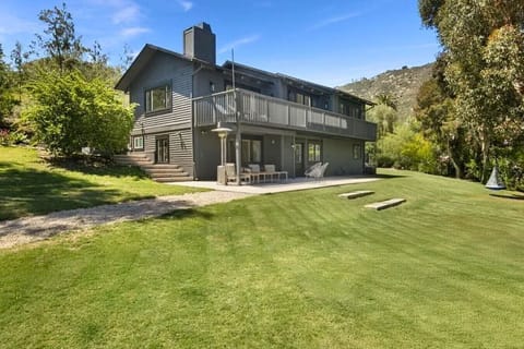 View of the home from the expansive front yard. Fully-fenced!