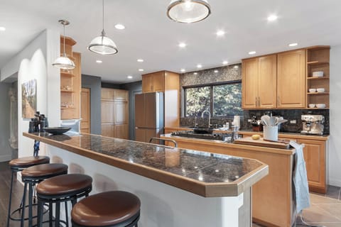 Kitchen. with everything you need to entertain. Island seating for four.