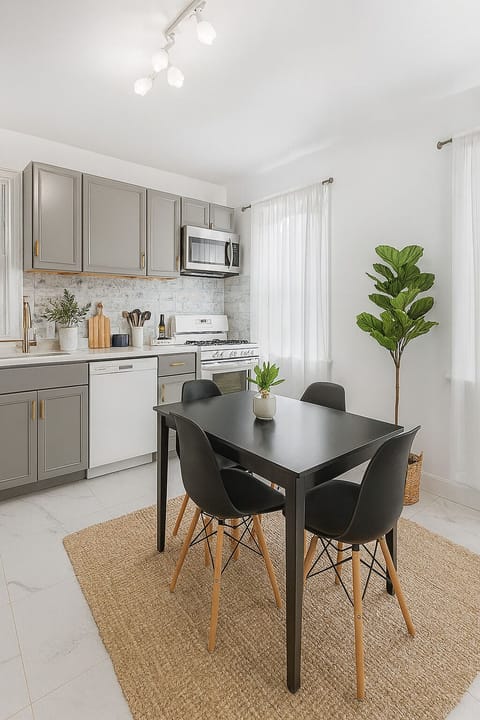 Enjoy a clean and stylish kitchen with a fridge, stove, microwave, coffee maker, and dishwasher—all ready for guest use.