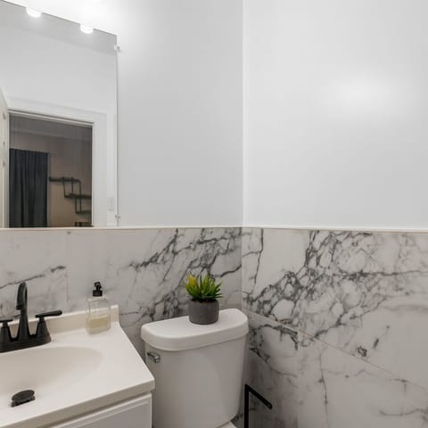 Everything you need is provided—from vanity lighting to bath mats and soaps.