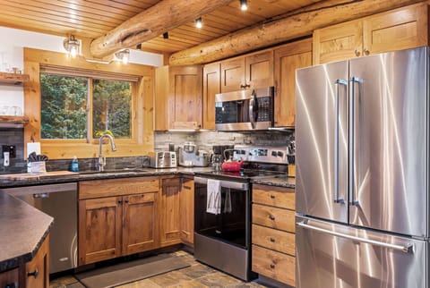 Kitchen (main floor): Drip coffee maker, Keurig, Crockpot, blender, kettle, cooking utensils, tableware