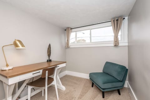 Catch up on emails or relax with a book in the landing office area