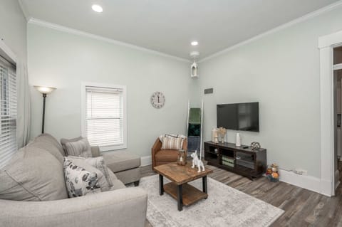 Curl up in the airy living room & stream your favorites on the smart TV