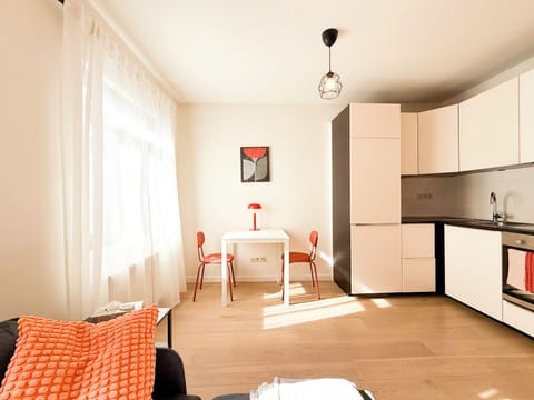 A cozy dining corner that can convert into a working space/desk.