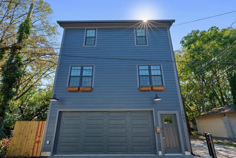 Park in the large 2-car garage with EV Charger
