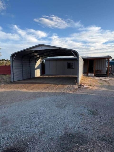 Covered parking for trucks or trailers.