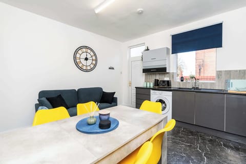 Simple yet elegant dining setup for group meals and evening chats.