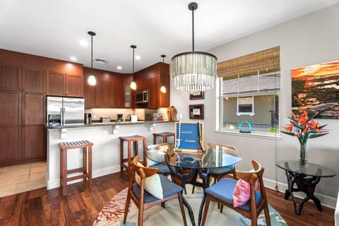 Cooking and conversation come easy with the connected kitchen and dining space in this spacious open plan.