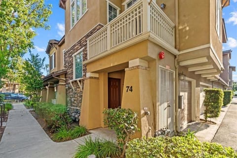 Front door and exterior view of the balcony