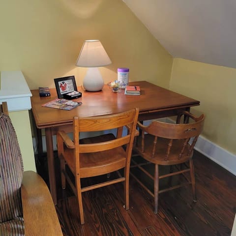 This quaint corner is perfect for eating or studying or working. There is a power strip on the table for all your devices. We also provide some breakfast bars for our guests. Gluten-free options are available. Just let us know before your stay.