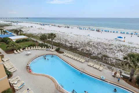 Steps from the sand and just above the pool — the perfect place to enjoy the best of both worlds.