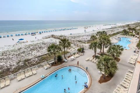 Steps from the sand and just above the pool — the perfect place to enjoy the best of both worlds.