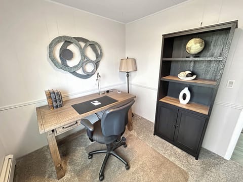 Private office with desk and desk chair