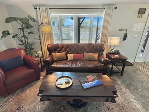 Comfy, spacious and well-decorated living room with smart TV