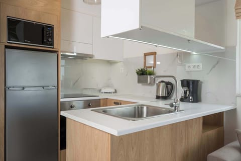 A fully equipped kitchen space where culinary creativity meets convenience.