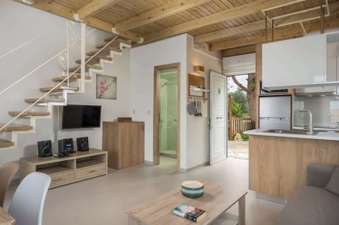 Whether you prefer a good book, TV, or music, our living area is equipped for your enjoyment. Unwind with a book or indulge in the latest shows and music using our sound system.