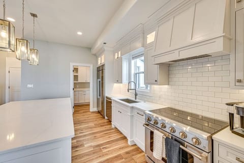 Bright Kitchen | Large Island with Seating | Pendant Lighting | Perfect for Casual Dining & Conversation