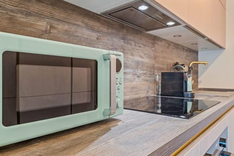 Whip up your favorite dishes in our compact, chic kitchen.