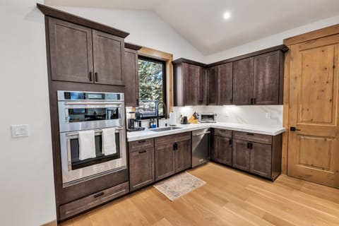 Kitchen with walk in pantry.