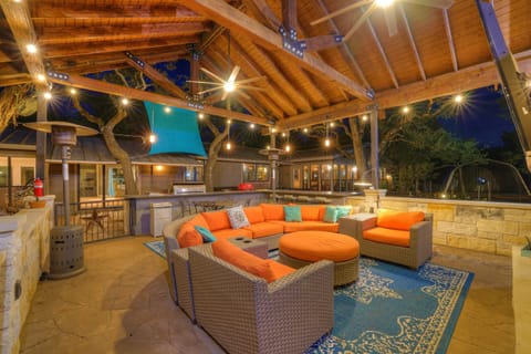 Vaulted pavilion, string lights, and cozy seating for unforgettable gatherings.