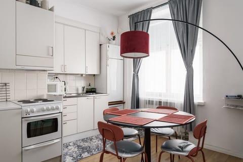 Modern, fully equipped kitchen with everything you need for cooking — including appliances, cookware, utensils, and basics like oil, salt, and pepper. Bright, spacious, and perfect for preparing meals during your stay.